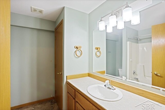 878 S Crooked Tree Ln, Midland, MI 48640 - bathroom featuring vanity and bathtub / shower combination