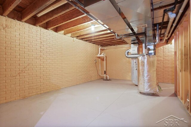 878 S Crooked Tree Ln, Midland, MI 48640 - unfinished below grade area with brick wall