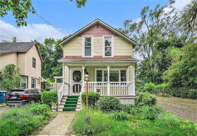 316 Reed Ave, Kalamazoo, MI 49001 - view of front facade featuring a porch