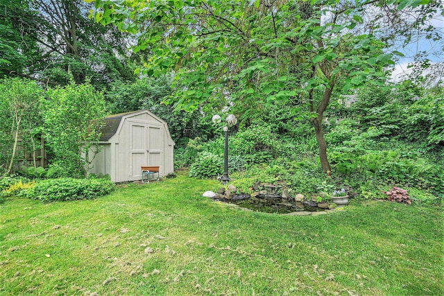 316 Reed Ave, Kalamazoo, MI 49001 - view of green lawn with a storage shed