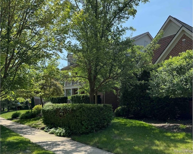 49941 Baychester Blvd, Canton, MI 48187 - view of front of property featuring brick siding and a front yard
