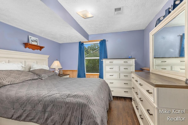 2742 Woodridge Dr, Jenison, MI 49428 - bedroom with dark wood-style flooring and a textured ceiling