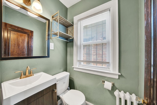 14311 Forrer St, Detroit, MI 48227 - half bath with radiator heating unit and vanity