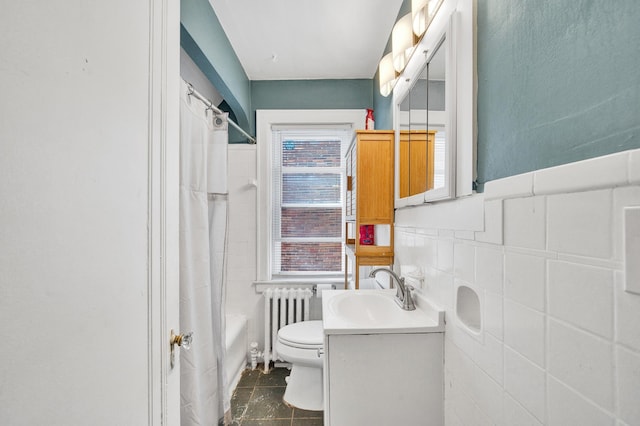 14311 Forrer St, Detroit, MI 48227 - bathroom with radiator heating unit, vanity, tile walls, and shower / bath combo