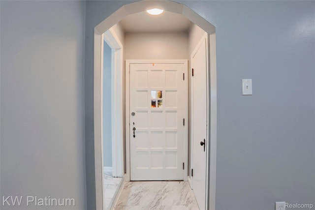 16054 Carlisle St, Detroit, MI 48205 - hall featuring arched walkways and light marble finish floors