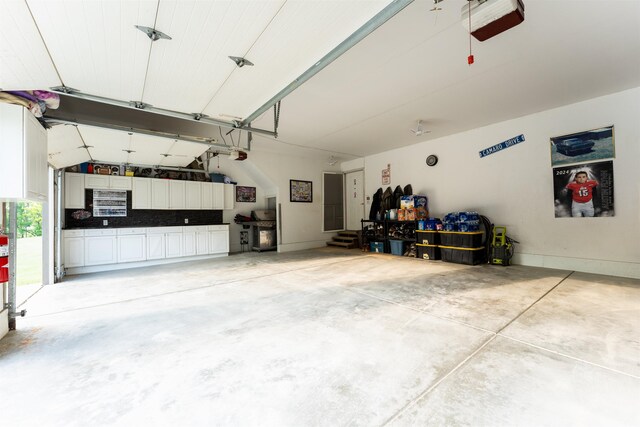6360 Ray Rd, Swartz Creek, MI 48473 - garage with a garage door opener
