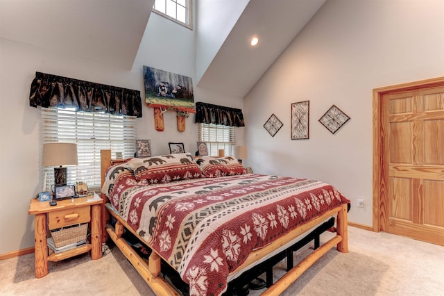 6360 Ray Rd, Swartz Creek, MI 48473 - carpeted bedroom with high vaulted ceiling, multiple windows, and recessed lighting