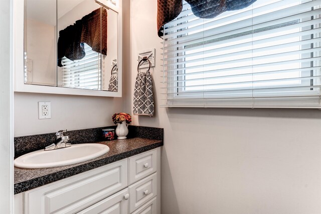 6360 Ray Rd, Swartz Creek, MI 48473 - bathroom featuring vanity