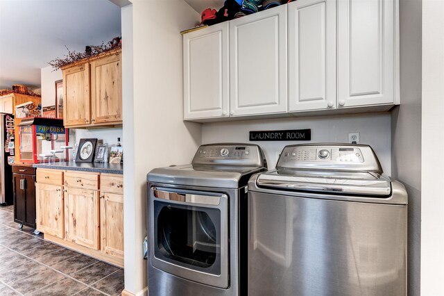 6360 Ray Rd, Swartz Creek, MI 48473 - washroom featuring washing machine and dryer, cabinet space, and tile patterned flooring