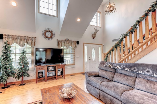 6360 Ray Rd, Swartz Creek, MI 48473 - living area with a high ceiling, wood finished floors, and recessed lighting