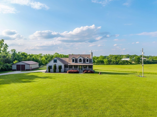 6360 Ray Rd, Swartz Creek, MI 48473 - view of front facade featuring a front yard, a chimney, and an outbuilding