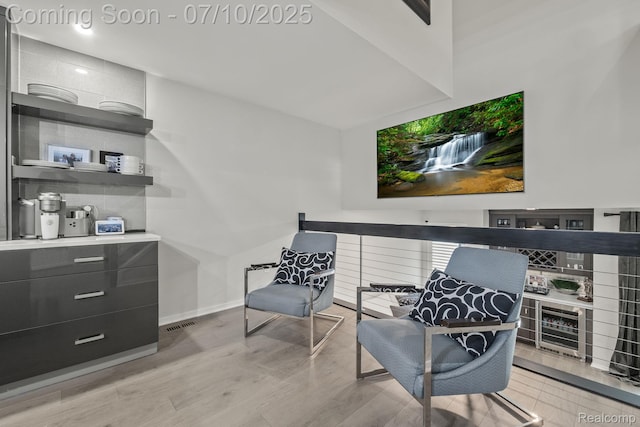 418 E 5th St Unit 2, Royal Oak, MI 48067 - sitting room featuring light wood finished floors and baseboards