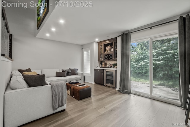 418 E 5th St Unit 2, Royal Oak, MI 48067 - living area with bar, beverage cooler, light wood-style floors, and recessed lighting