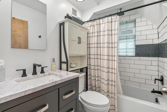 2646 Forest Grove Ave SW, Wyoming, MI 49519 - bathroom featuring vanity and shower / bath combo with shower curtain