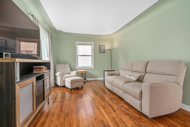 2646 Forest Grove Ave SW, Wyoming, MI 49519 - living area with wood finished floors and a dry bar