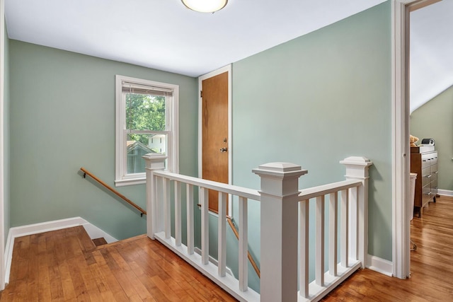 2646 Forest Grove Ave SW, Wyoming, MI 49519 - hallway with an upstairs landing and wood finished floors