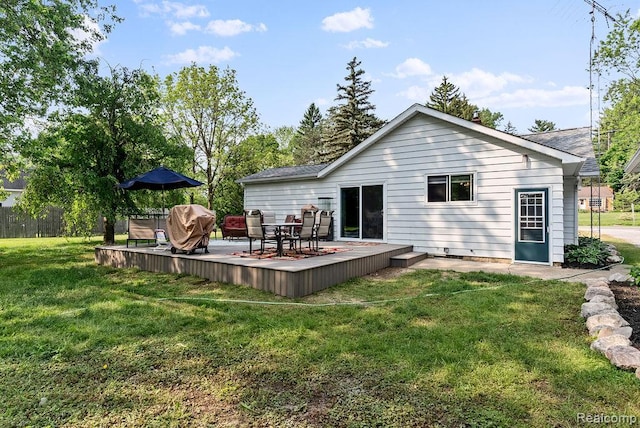 316 N Seymour Rd, Flushing, MI 48433 - rear view of house featuring a lawn and a wooden deck