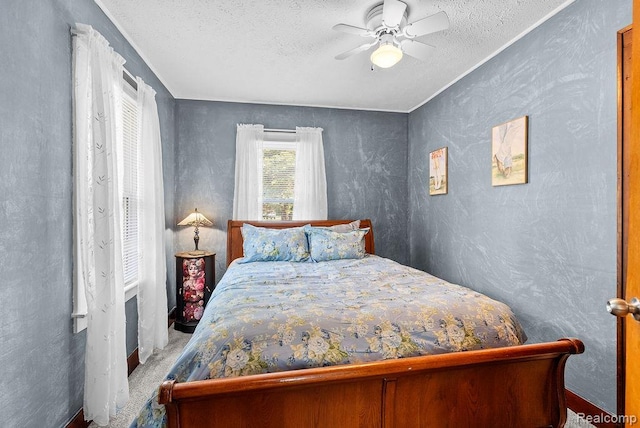 316 N Seymour Rd, Flushing, MI 48433 - carpeted bedroom featuring a textured ceiling and a ceiling fan