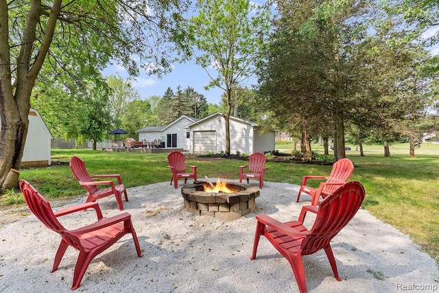 316 N Seymour Rd, Flushing, MI 48433 - view of patio / terrace with an outdoor fire pit