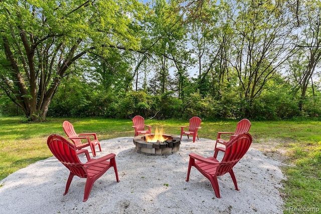 316 N Seymour Rd, Flushing, MI 48433 - view of patio featuring an outdoor fire pit