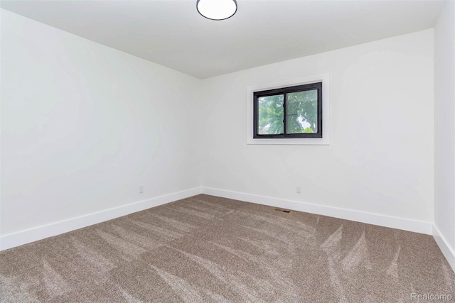 47387 Royal Rd, Macomb, MI 48044 - carpeted empty room with baseboards