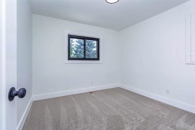 47387 Royal Rd, Macomb, MI 48044 - spare room featuring carpet floors and baseboards