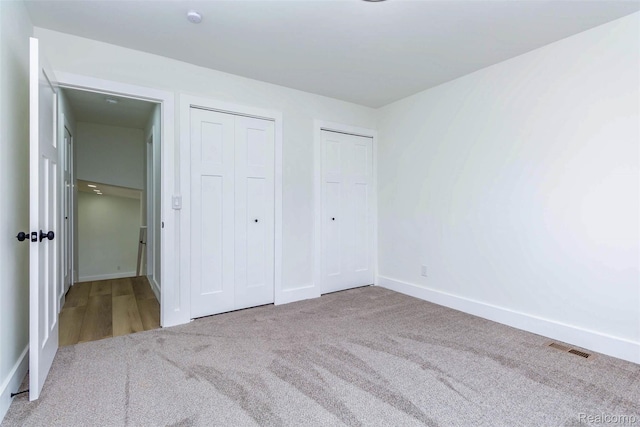 47387 Royal Rd, Macomb, MI 48044 - unfurnished bedroom with carpet floors and baseboards