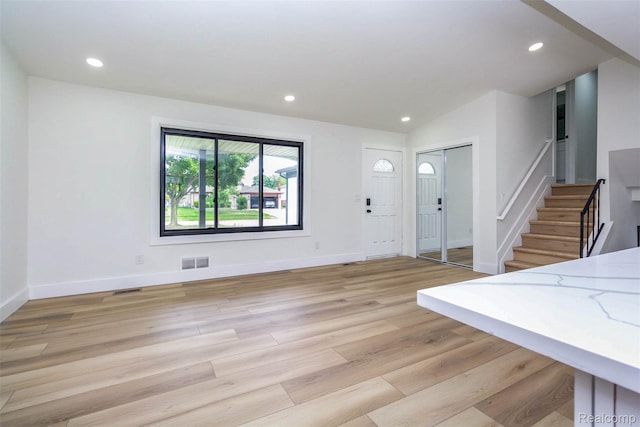 47387 Royal Rd, Macomb, MI 48044 - entrance foyer with light wood-style floors, stairway, and recessed lighting