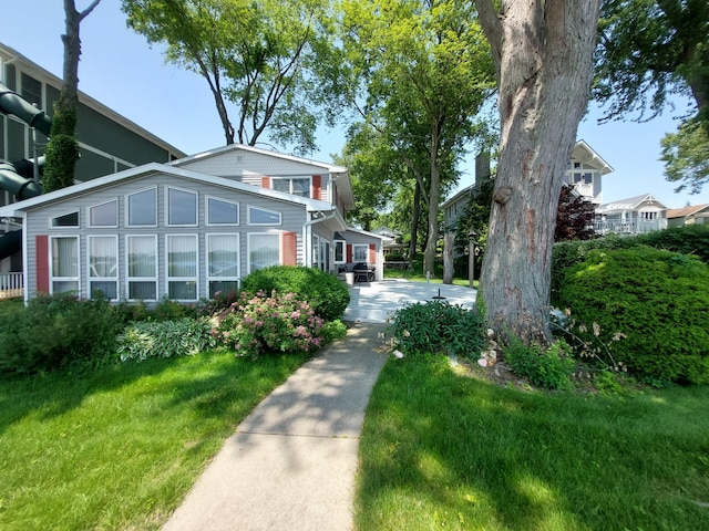 23675 N Shore Dr, Edwardsburg, MI 49112 - view of side of property with a yard