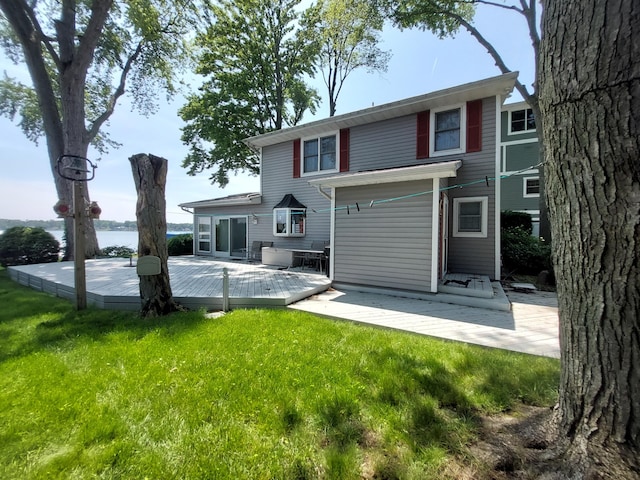 23675 N Shore Dr, Edwardsburg, MI 49112 - rear view of property featuring a yard and a deck