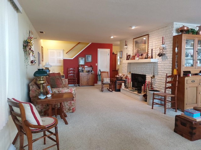 23675 N Shore Dr, Edwardsburg, MI 49112 - carpeted living room featuring a brick fireplace