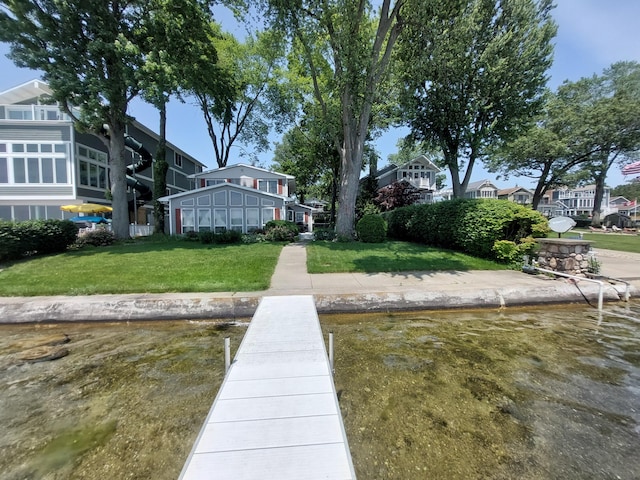 23675 N Shore Dr, Edwardsburg, MI 49112 - dock area featuring a lawn