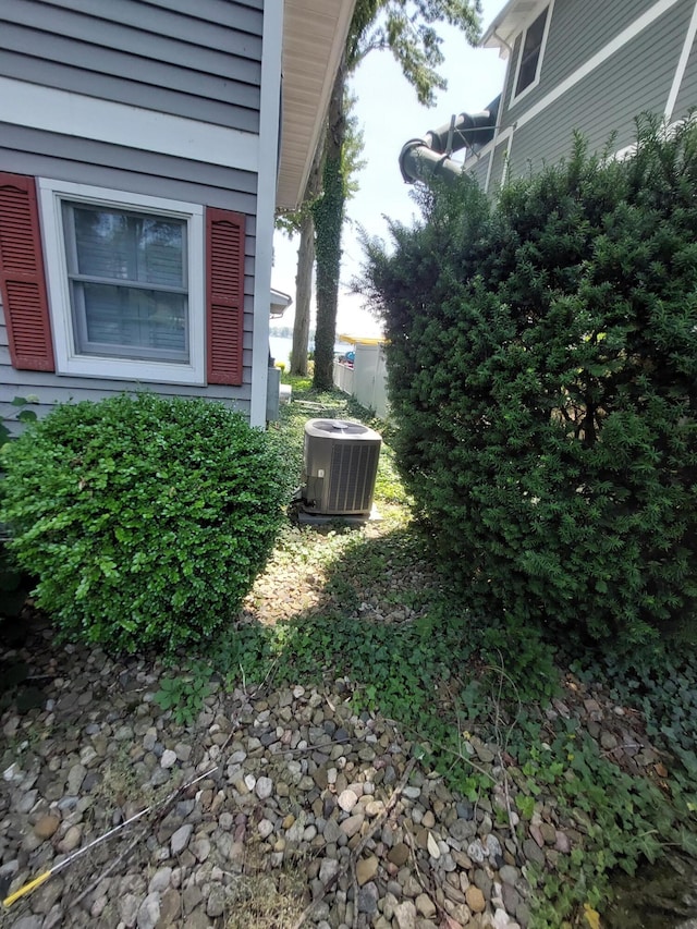 23675 N Shore Dr, Edwardsburg, MI 49112 - view of side of property with a central AC unit