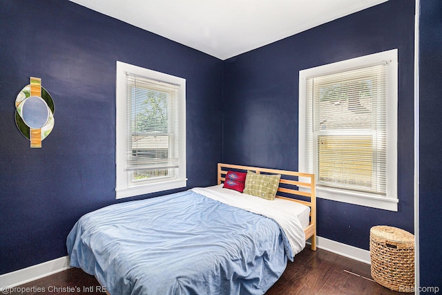 1407 W Marshall St, Ferndale, MI 48220 - bedroom featuring baseboards and wood finished floors