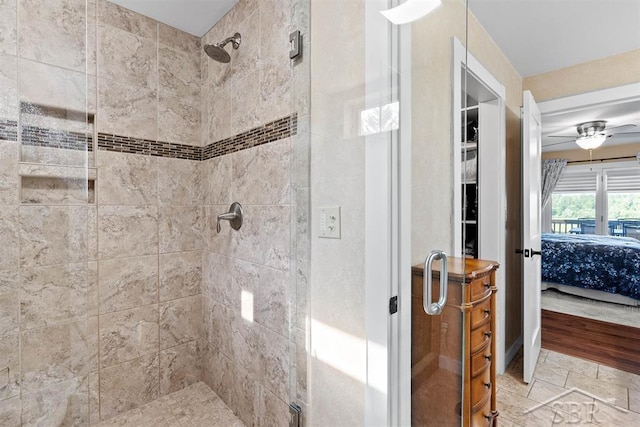 4394 N Francis Shores Ave, Sanford, MI 48657 - full bath with ensuite bath, a stall shower, and ceiling fan