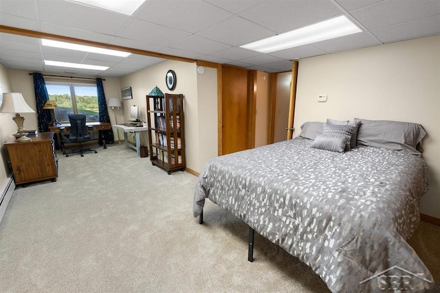 4394 N Francis Shores Ave, Sanford, MI 48657 - bedroom with carpet floors, a drop ceiling, and an office area