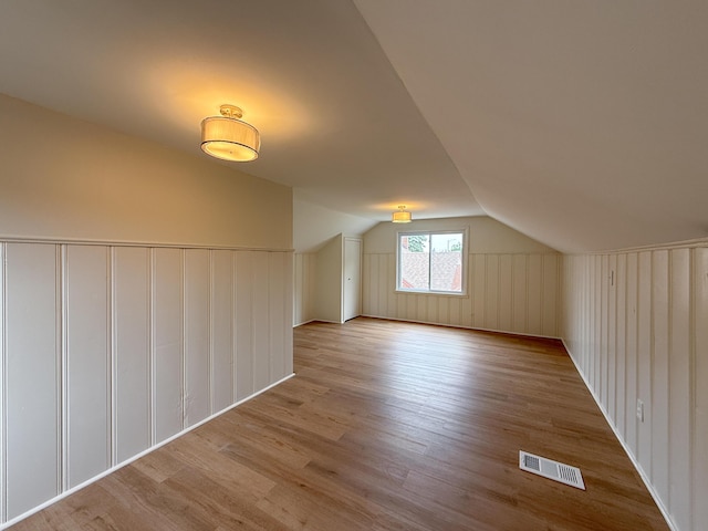 5016 E Outer Dr, Detroit, MI 48234 - bonus room featuring vaulted ceiling and wood finished floors