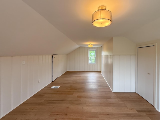5016 E Outer Dr, Detroit, MI 48234 - additional living space with lofted ceiling and wood finished floors