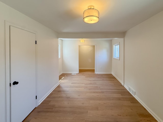 5016 E Outer Dr, Detroit, MI 48234 - empty room with light wood finished floors and baseboards