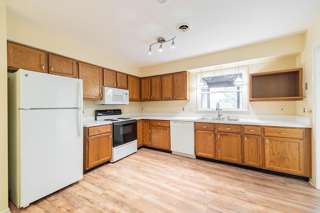8597 Mathias Dr Unit 42, Grosse Ile, MI 48138 - kitchen featuring white appliances, brown cabinets, light wood-style flooring, open shelves, and light countertops