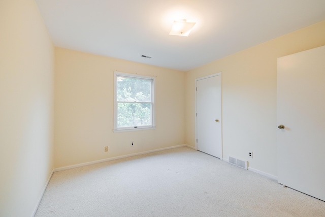 8597 Mathias Dr Unit 42, Grosse Ile, MI 48138 - spare room with light carpet