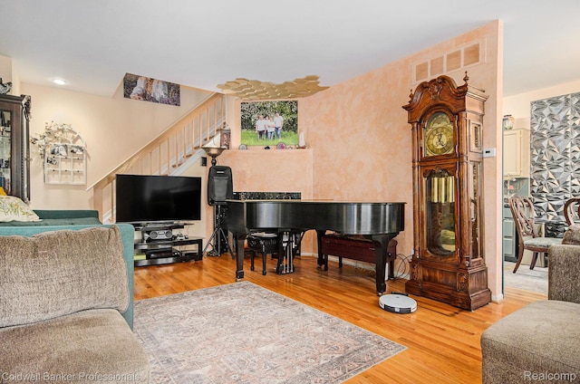 7176 Nottingham, West Bloomfield, MI 48322 - living area featuring stairway and light wood finished floors