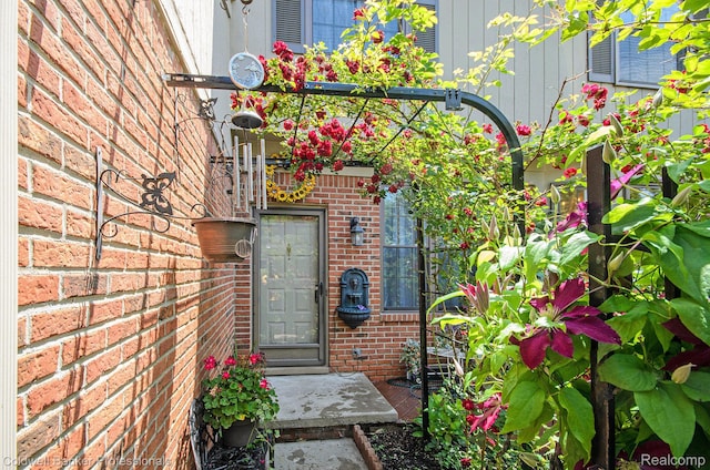 7176 Nottingham, West Bloomfield, MI 48322 - doorway to property featuring brick siding
