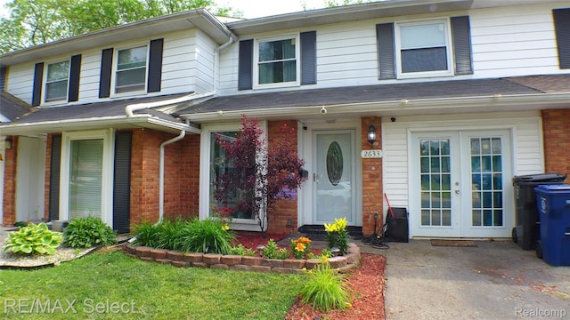 2633 Orchard Ln, Flint, MI 48504 - view of front of property with french doors and brick siding