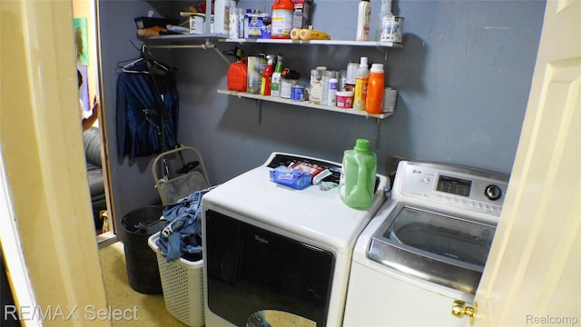 2633 Orchard Ln, Flint, MI 48504 - laundry room featuring washer and clothes dryer