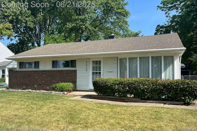 3620 Chester Rd, Royal Oak, MI 48073 - ranch-style home with brick siding, a front yard, and a shingled roof