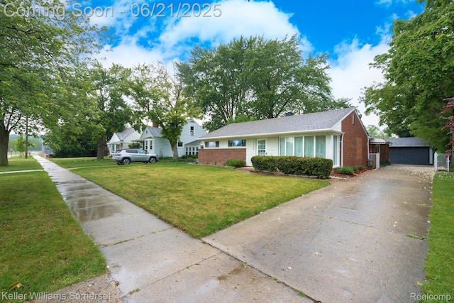 3620 Chester Rd, Royal Oak, MI 48073 - ranch-style home with brick siding, a front lawn, roof with shingles, and an outdoor structure