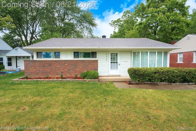 3620 Chester Rd, Royal Oak, MI 48073 - ranch-style house featuring brick siding, a front yard, and roof with shingles