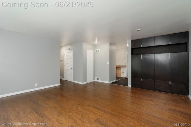 3620 Chester Rd, Royal Oak, MI 48073 - unfurnished living room with wood finished floors and baseboards