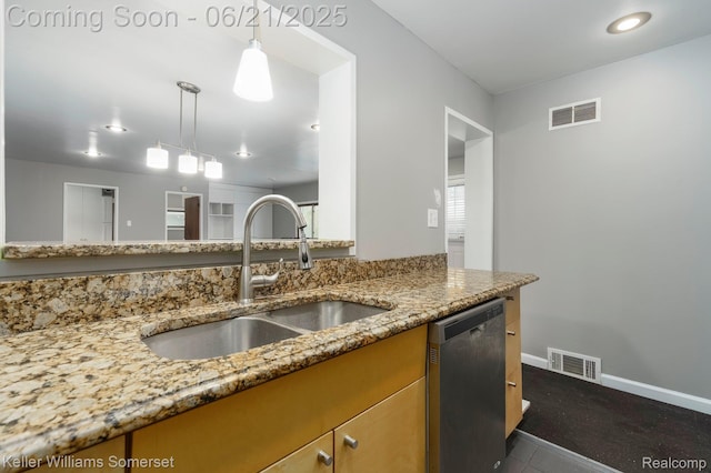 3620 Chester Rd, Royal Oak, MI 48073 - kitchen featuring stainless steel dishwasher, light stone counters, hanging light fixtures, brown cabinetry, and recessed lighting